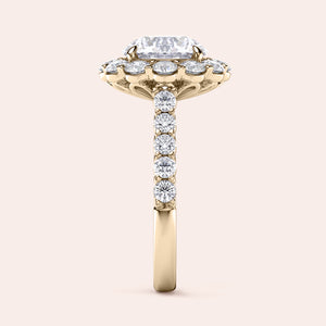 Elegant ring featuring an emerald-shaped diamond with round diamonds, available in 14K/18K gold or platinum.