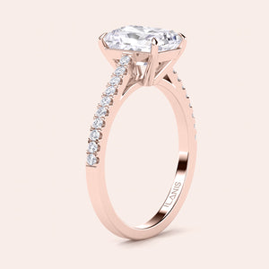 Elegant rose gold engagement ring with a brilliant cut diamond in 14K, 18K, or platinum, featuring a stunning pave setting.