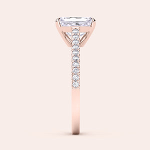 Elegant rose gold ring with emerald-cut diamond and round diamonds, available in 14K, 18K, or platinum for a luxurious touch.