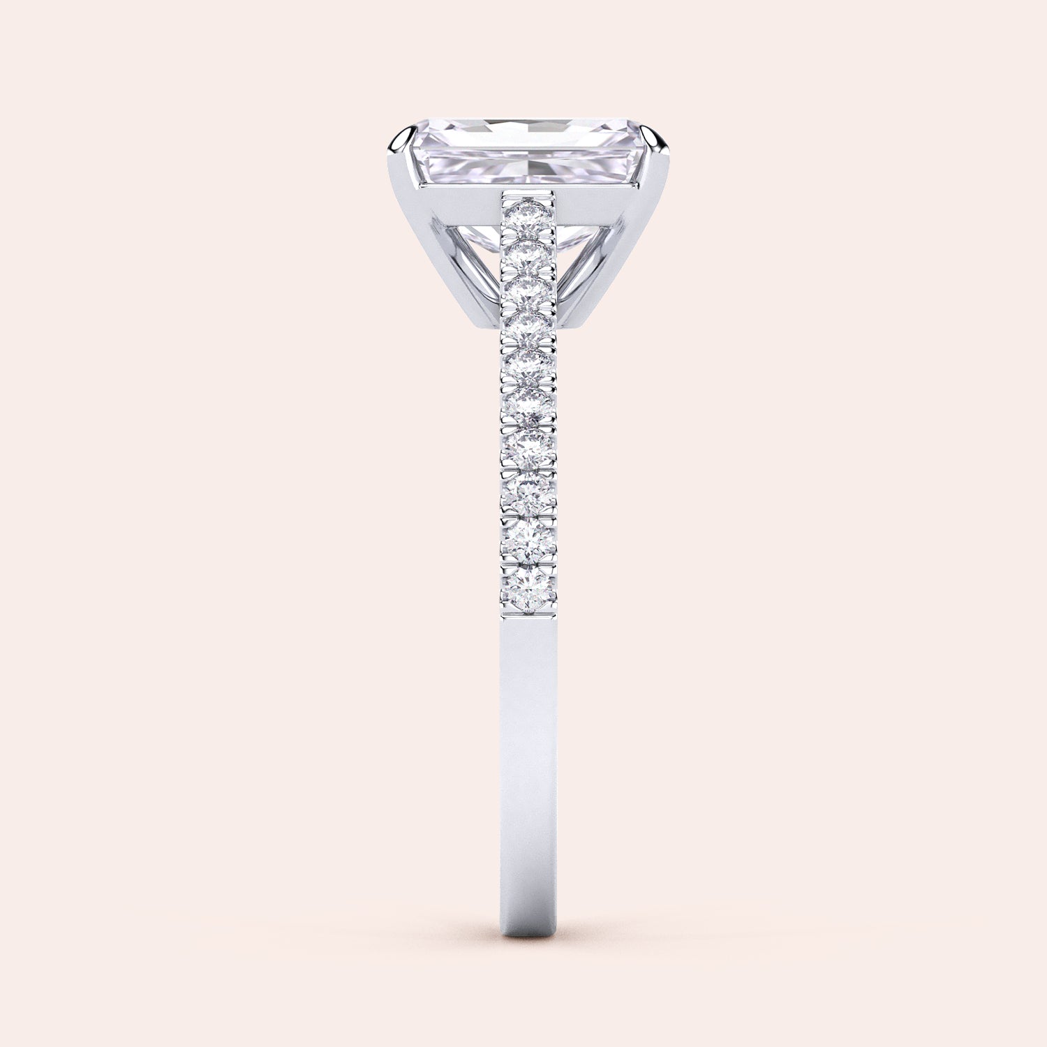 Elegant 14K or 18K gold and platinum ring featuring an emerald-cut diamond, showcasing intricate craftsmanship, perfect for engagements.|

#14KRecycledWhiteGold
#18KRecycledWhiteGold
#Platinum






