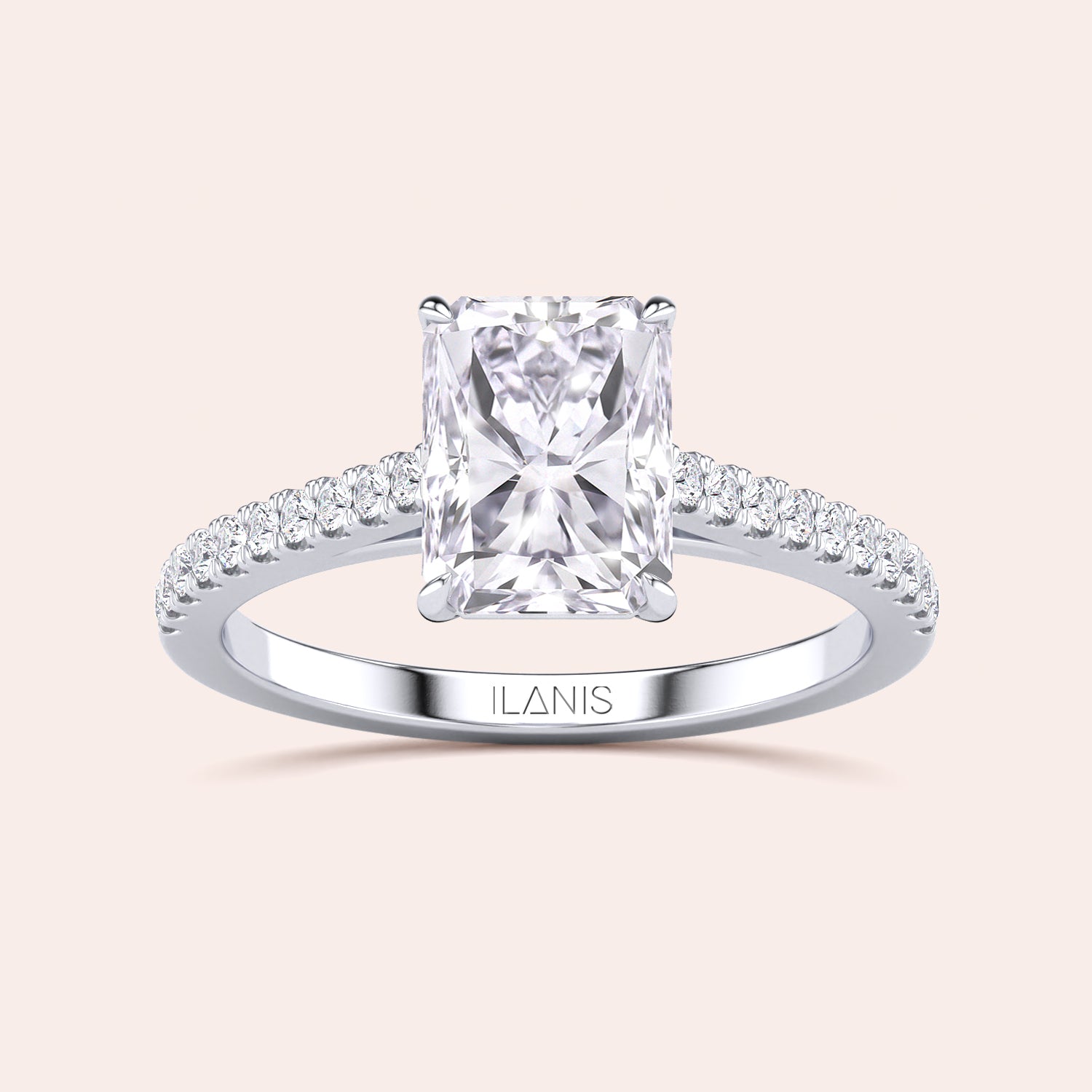 Elegant engagement ring with a radiant-cut diamond in 14K/18K gold or platinum, featuring smaller diamonds for exquisite elegance.|

#14KRecycledWhiteGold
#18KRecycledWhiteGold
#Platinum






