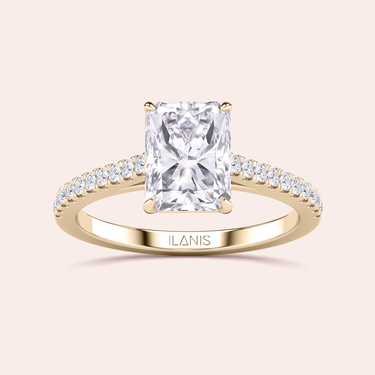 Radiant-cut diamond engagement ring in 14K gold with sparkling band, showcasing luxury and elegance on a neutral background.|





#14KRecycledYellowGold 
#18KRecycledYellowGold 