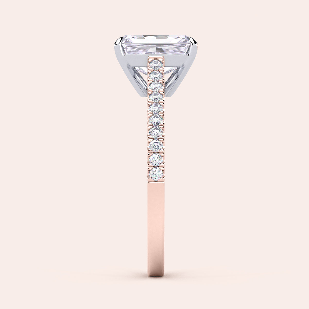Two-tone 14K white and rose gold engagement ring featuring a grey radiant-cut diamond and pave diamond band. 