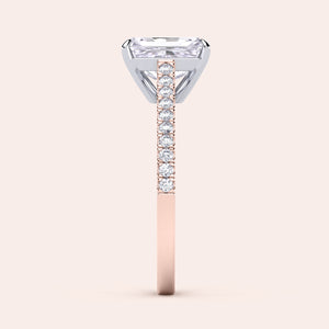 Two-tone 14K white and rose gold engagement ring featuring a grey radiant-cut diamond and pave diamond band. 