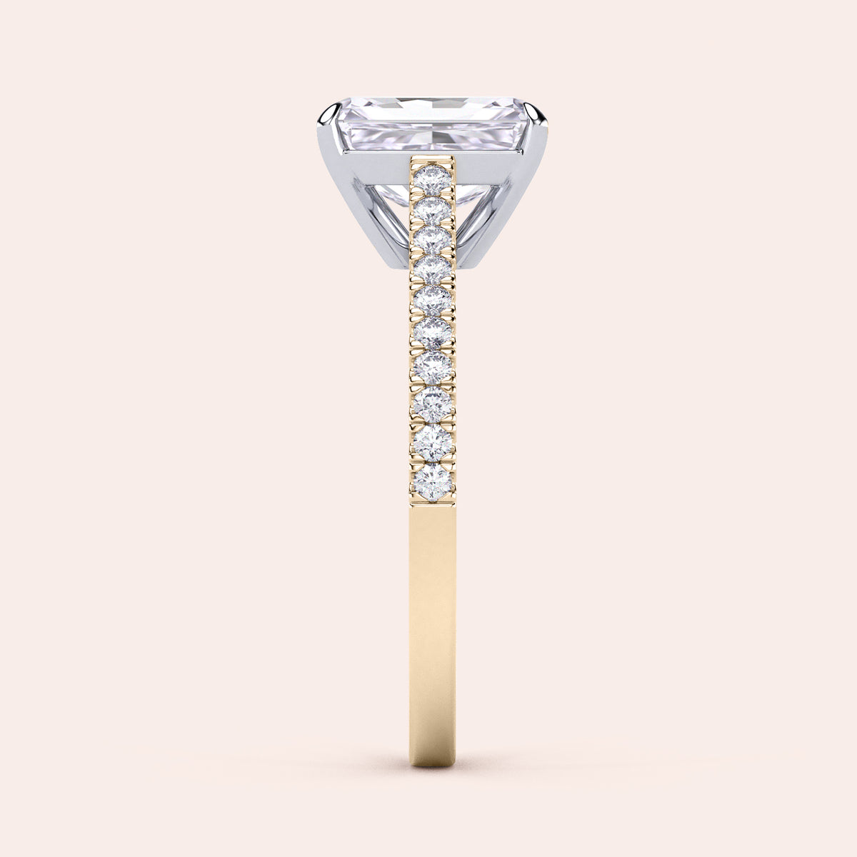 Two-tone 14K/18K gold diamond ring featuring a radiant-cut stone in a cathedral setting with pave band, perfect for engagement. 