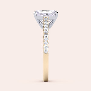 Two-tone 14K/18K gold diamond ring featuring a radiant-cut stone in a cathedral setting with pave band, perfect for engagement. 