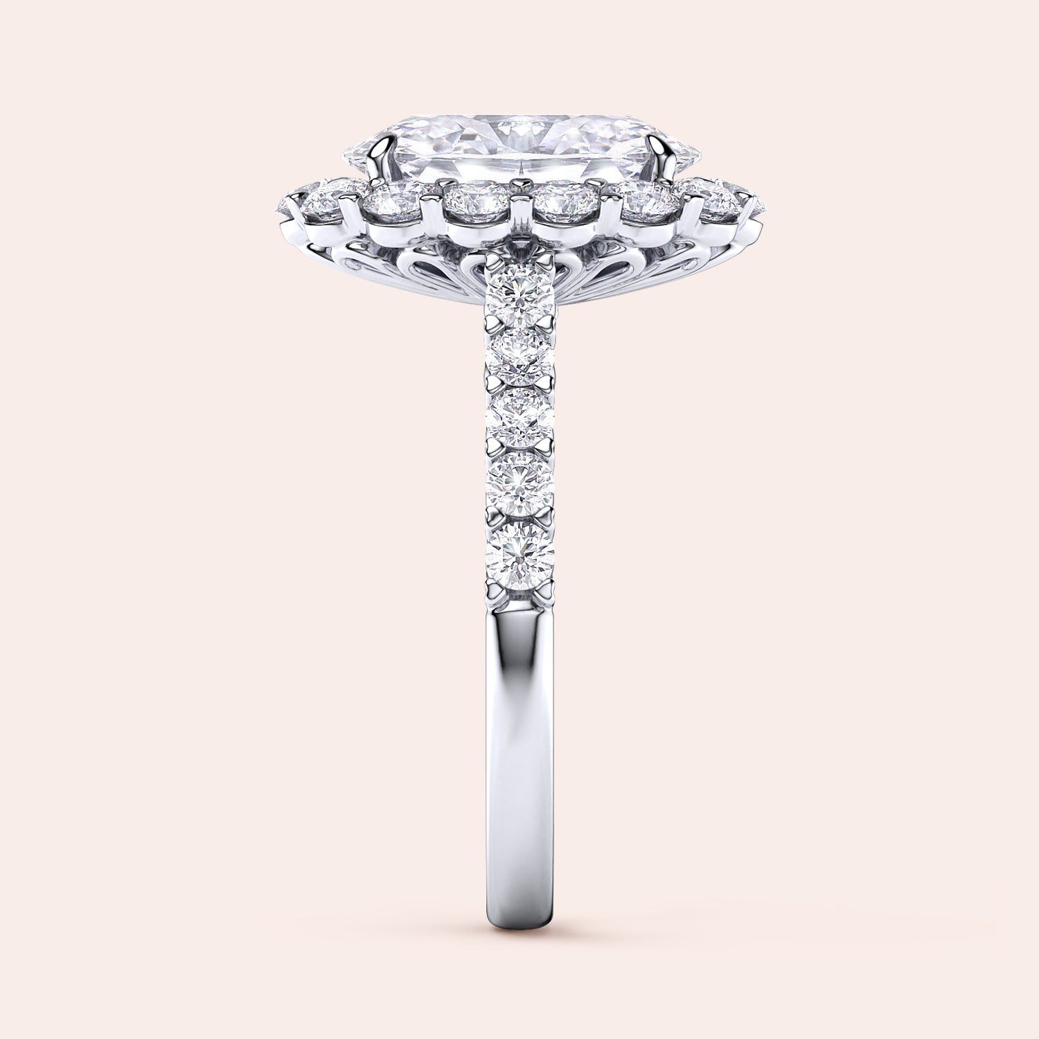 Elegant side view of a stunning 14K/18K white gold engagement ring with an elongated cushion cut diamond and halo of smaller diamonds.|

#14KRecycledWhiteGold
#18KRecycledWhiteGold
#Platinum






