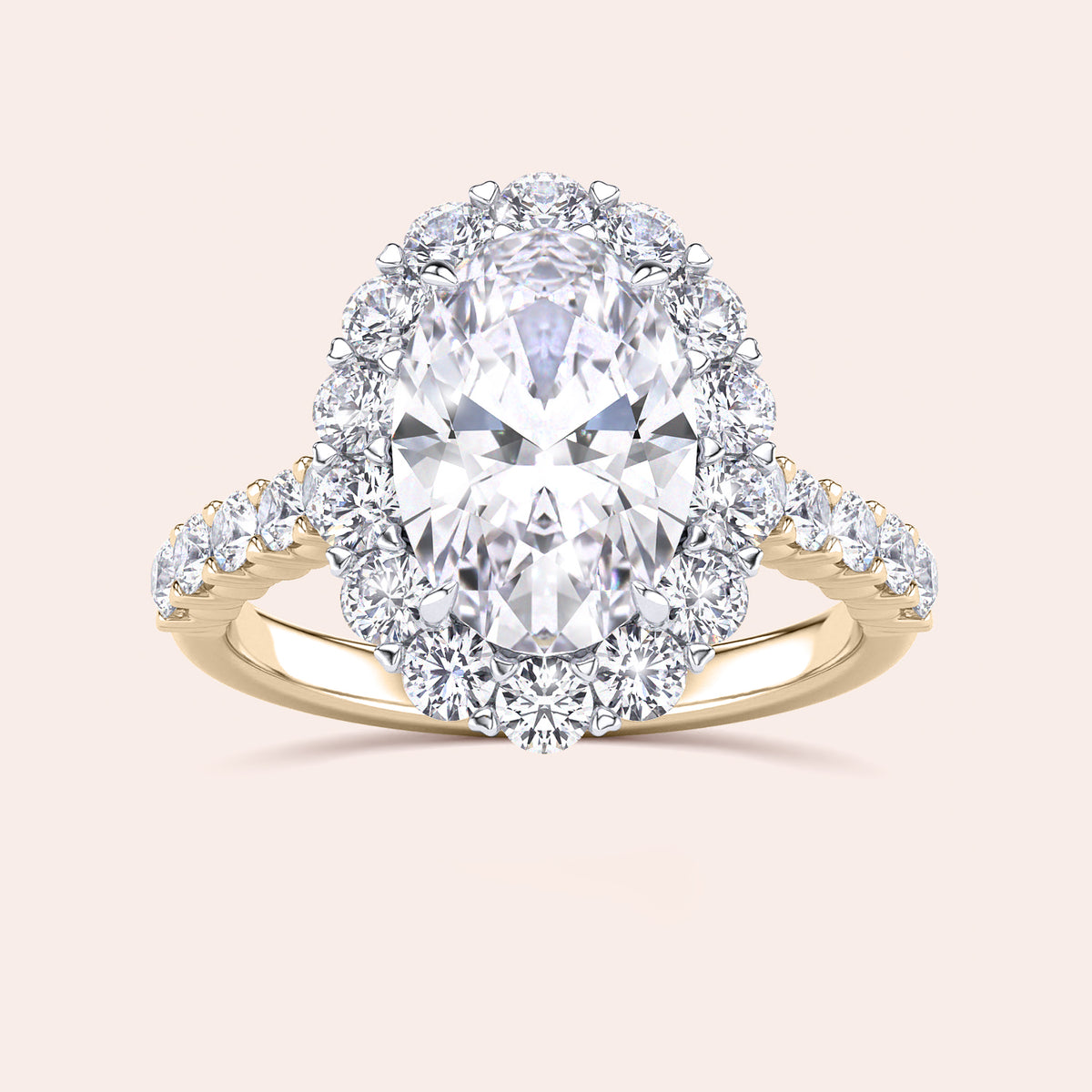 Two-tone 14K gold oval diamond ring with halo and pave band, featuring white and yellow gold design for elegant engagement. 