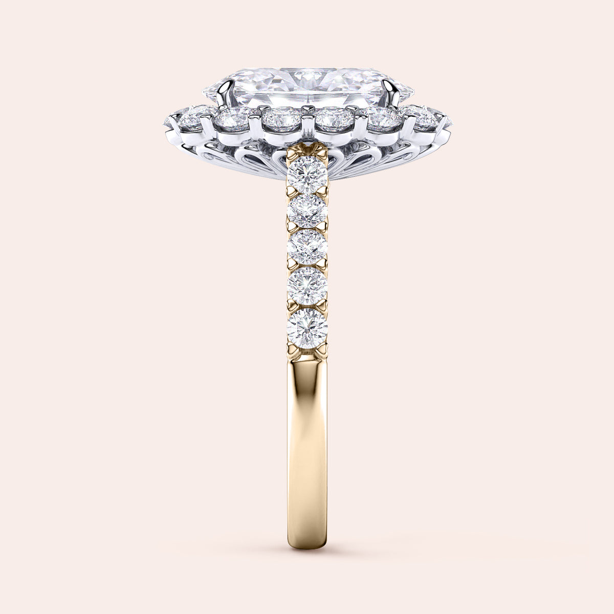 Two-tone 14K gold diamond ring featuring an oval cut stone with halo and pave band, perfect for engagement. 