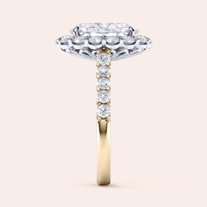 Two-tone 14K gold diamond ring featuring an oval cut stone with halo and pave band, perfect for engagement. 
