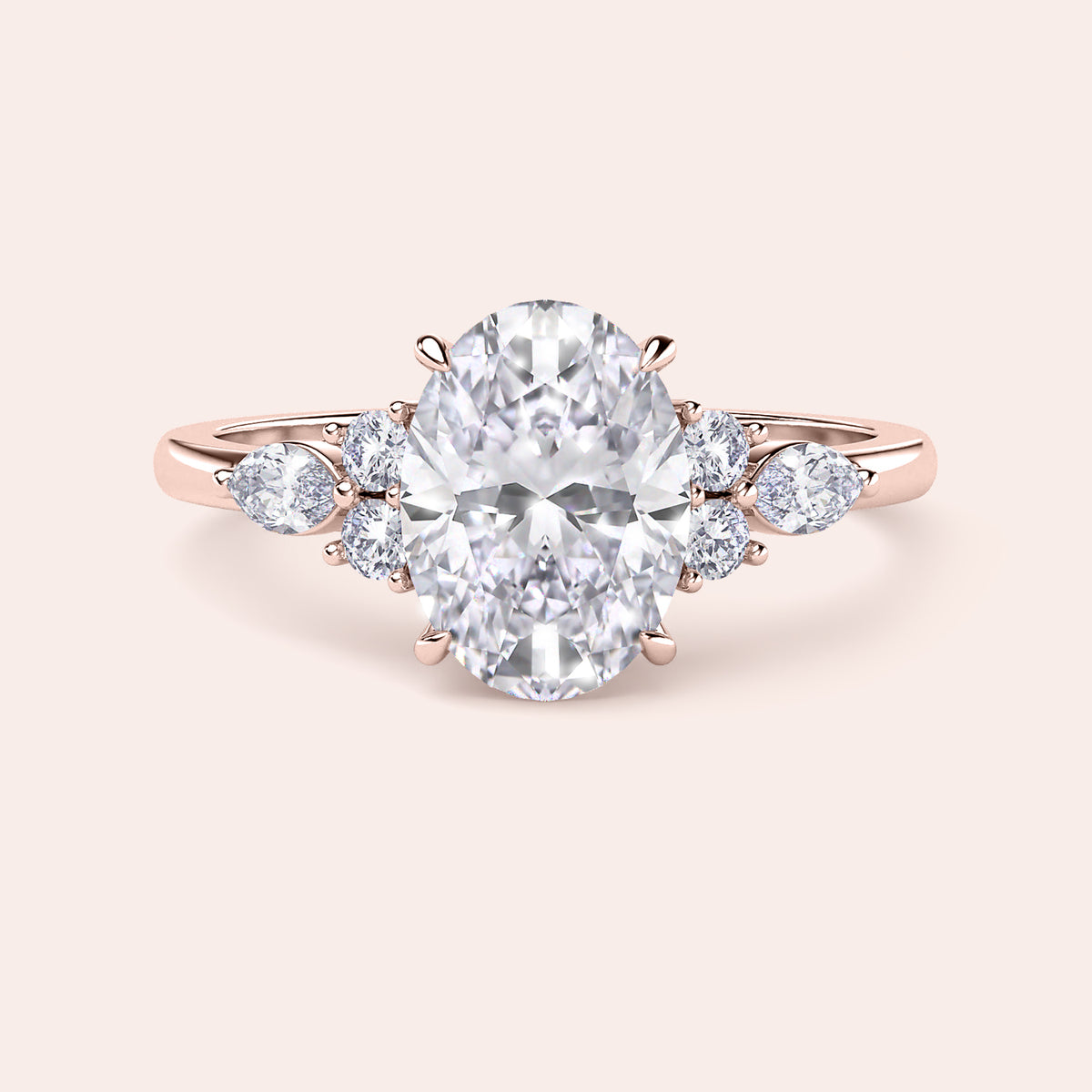 Elegant oval diamond engagement ring in 14K or 18K gold or platinum, featuring side stones for a sophisticated look. Not worn on model.