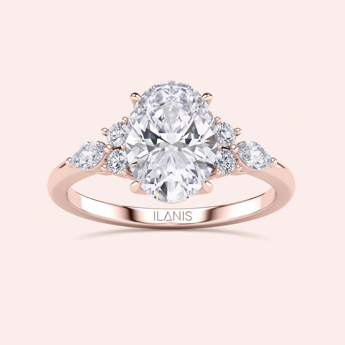 Elegant pear-shaped diamond engagement ring in rose gold, available in 14K, 18K, or platinum, with a stunning centerpiece and round diamond accents.
