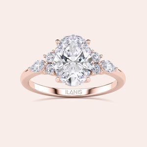 Elegant pear-shaped diamond engagement ring in rose gold, available in 14K, 18K, or platinum, with a stunning centerpiece and round diamond accents.