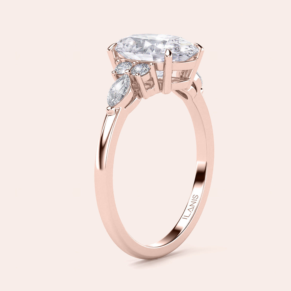 Elegant diamond engagement ring featuring a cushion-cut diamond and side stones, available in 14K, 18K gold, or platinum.