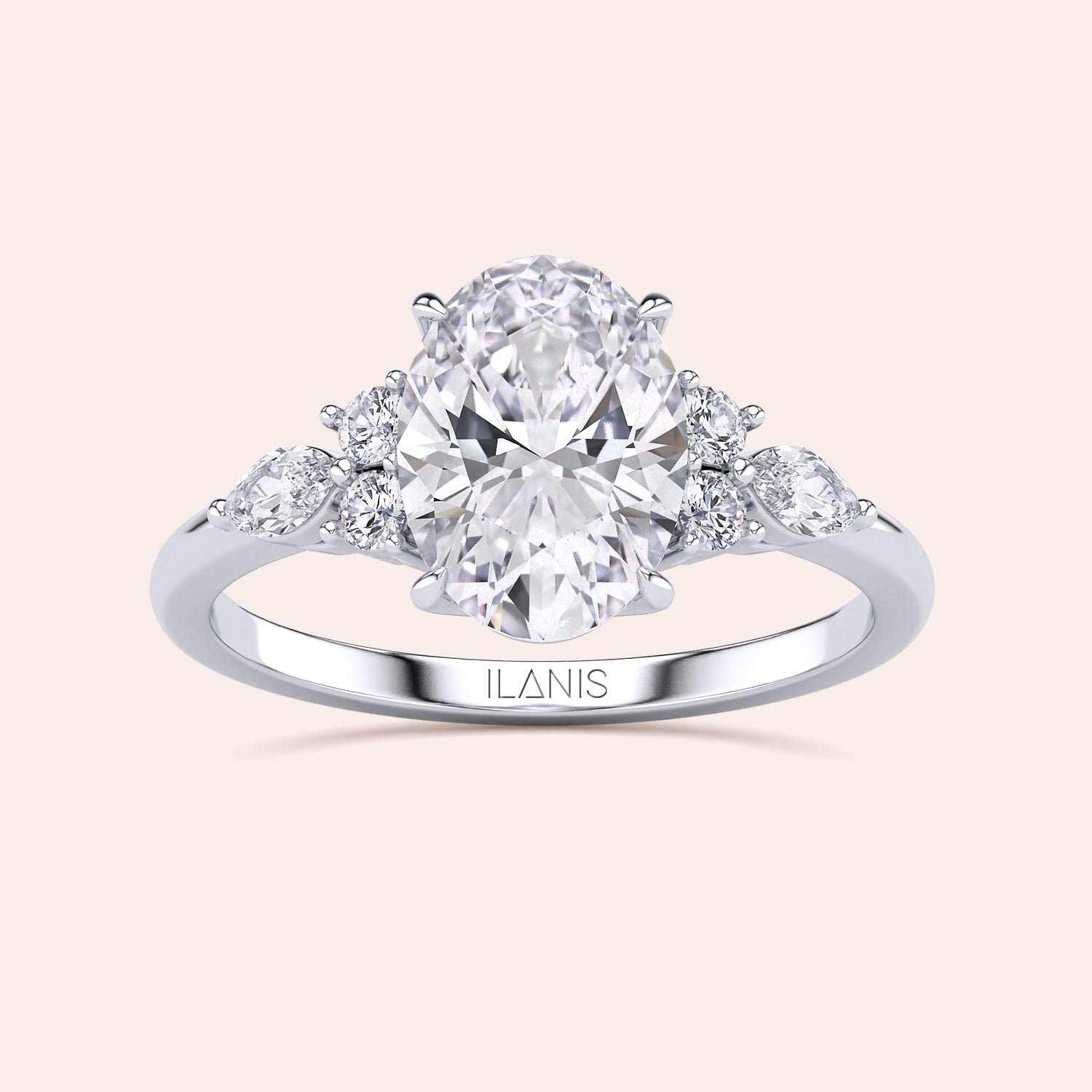 Stunning 14K engagement ring with an oval diamond center and side stones, showcasing brilliance and elegance for a memorable proposal.|

#14KRecycledWhiteGold
#18KRecycledWhiteGold
#Platinum






