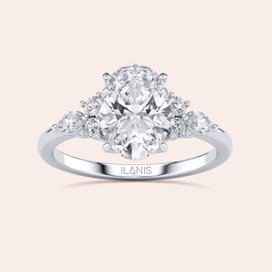 Stunning 14K engagement ring with an oval diamond center and side stones, showcasing brilliance and elegance for a memorable proposal.