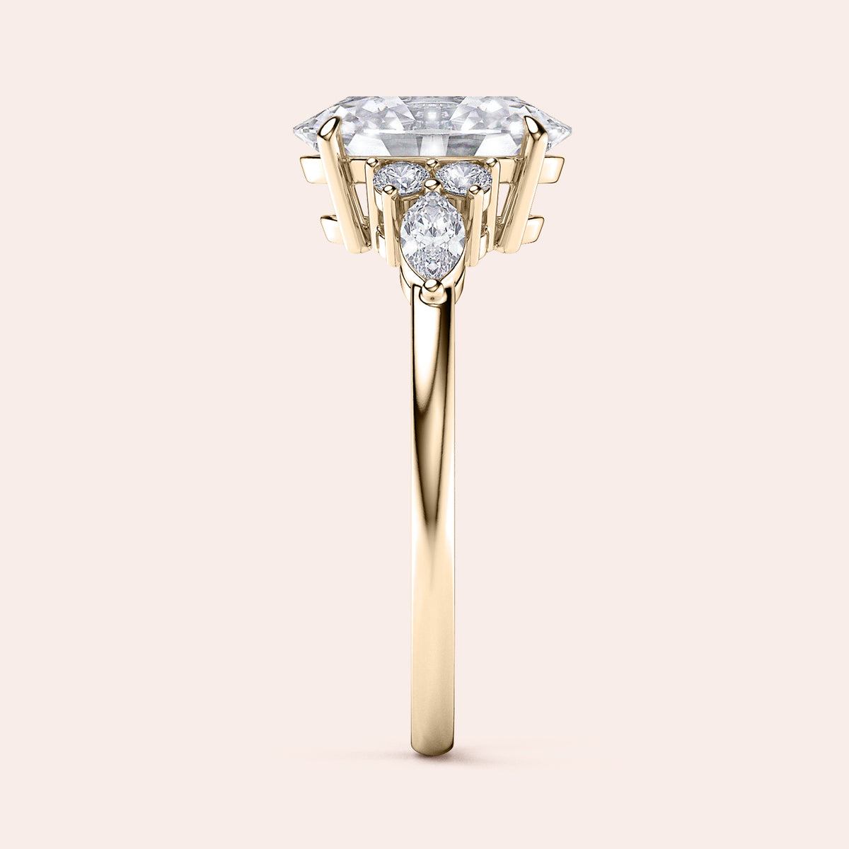 Elegant engagement ring with an emerald-shaped diamond in 14K or 18K gold or platinum, enhanced by captivating side stones.