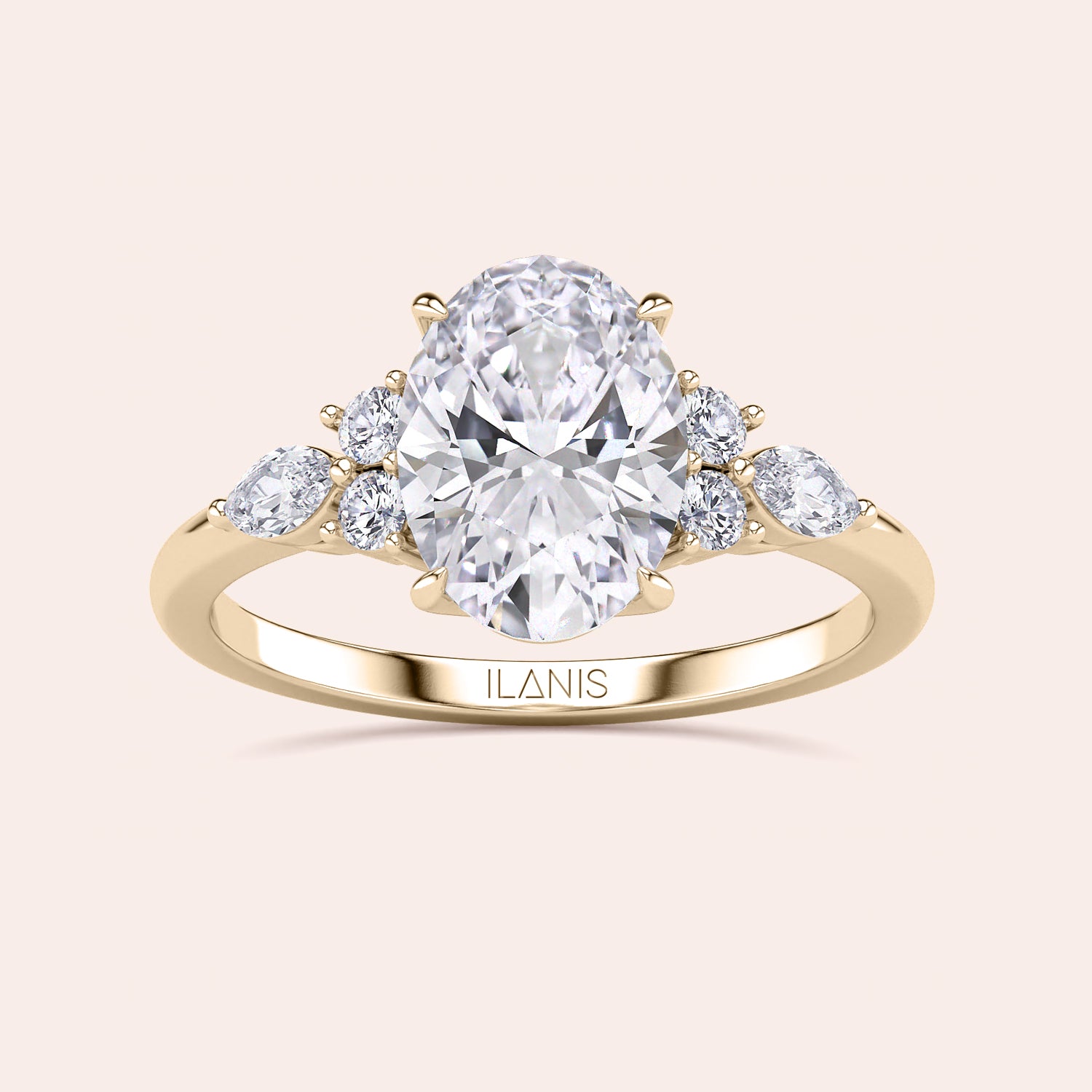 Elegant pear-shaped diamond ring in 14K/18K gold or platinum, showcasing a stunning center diamond with smaller round accents.|

#14KRecycledYellowGold 
#18KRecycledYellowGold 