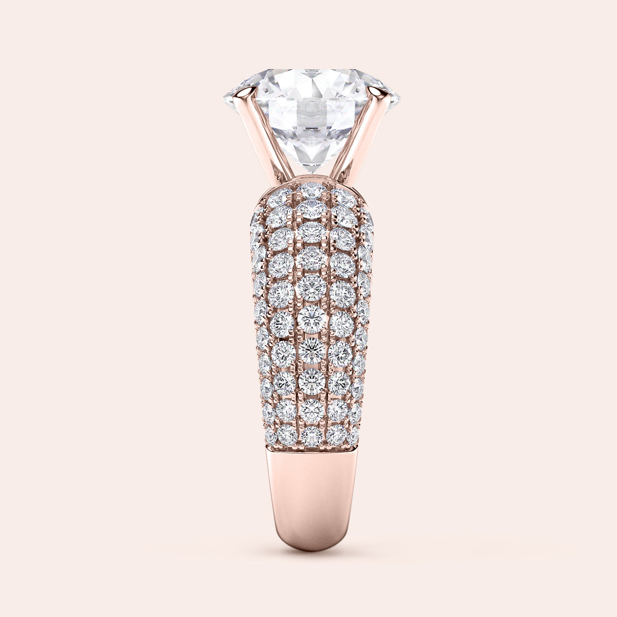 Luxurious 14K or 18K gold engagement ring with a round brilliant diamond in a unique pavé setting, not worn on a model.