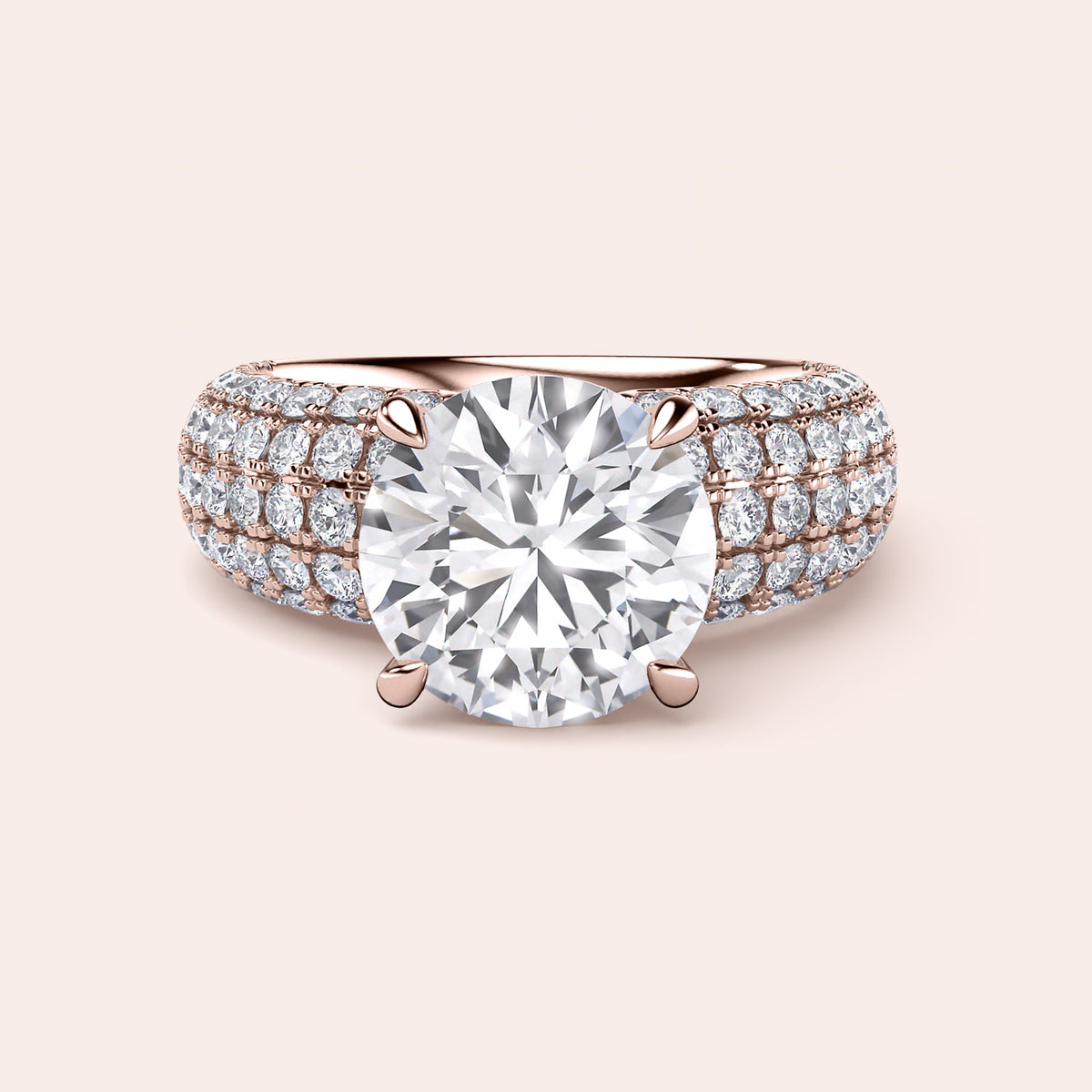 Luxurious 14K rose gold ring with stunning round-cut diamond and pavé-set diamonds on the band.