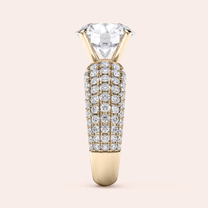 Luxurious round diamond ring in 14K or 18K gold or platinum, featuring an oval-cut diamond solitaire and smaller diamonds on the band.