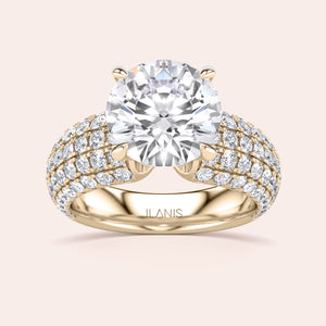 Elegant round-cut diamond ring in yellow gold with side diamonds, available in 14K, 18K, or platinum for a luxurious touch.