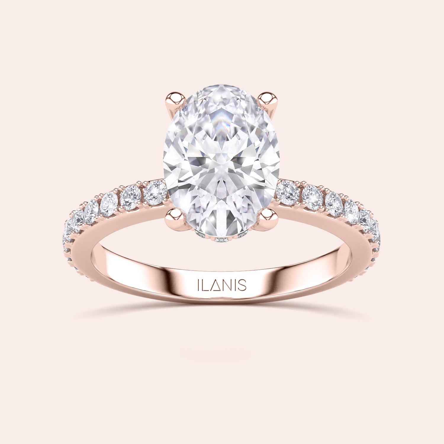 Elegant oval-shaped diamond engagement ring in 14K rose gold, with side diamonds. Available in 18K or platinum settings.|

#14KRecycledRoseGold
#18KRecycledRoseGold

