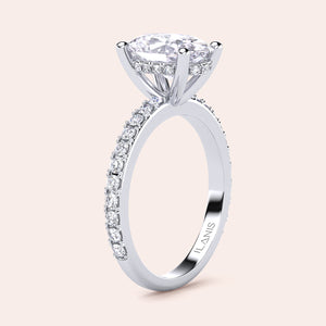 Stunning 14K or 18K gold/platinum engagement ring with a radiant round diamond in a pavé setting, perfect for proposals.