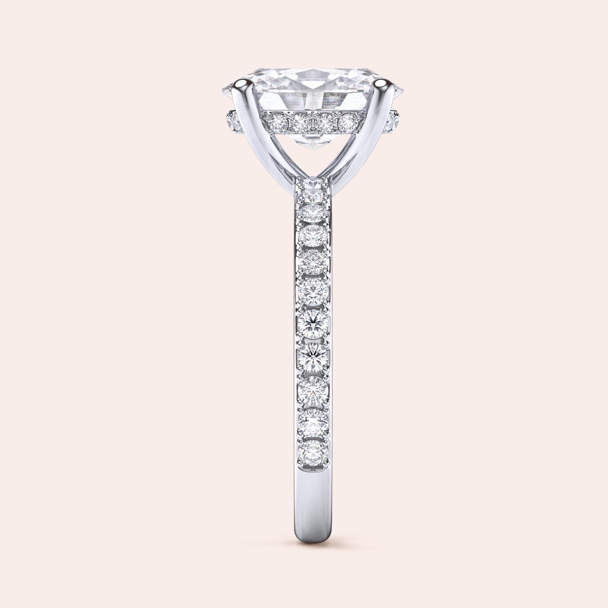 Elegant engagement ring with a radiant round diamond and pave band, available in 14K/18K gold or platinum, set against a neutral background.