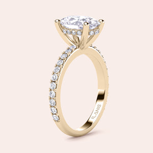 Elegant oval diamond engagement ring in 14K gold, featuring a sparkling diamond band and a prominent solitaire setting.