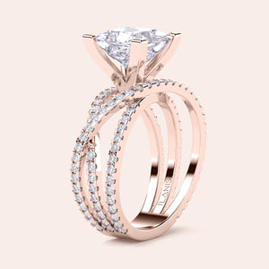 Elegantly designed oval diamond engagement ring with halo and pavé bands, available in 14K and 18K gold or platinum.