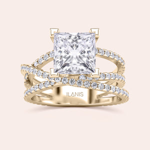 Stunning 14K gold ring with radiant-princess cut diamond in criss-cross band, accented by small diamonds for added elegance.
