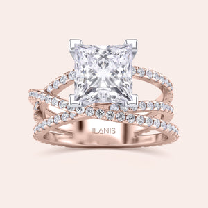 Two-tone princess-cut diamond ring in 14K/18K white and rose gold with swirl pave diamond band, perfect for engagement. 
