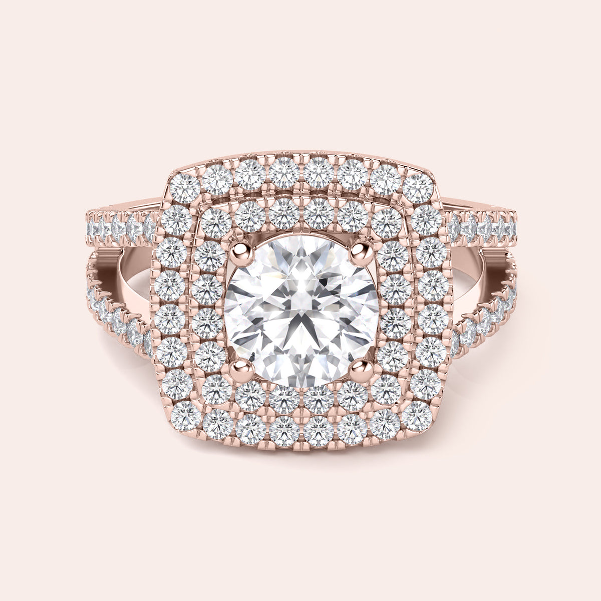 Elegant cushion-cut diamond engagement ring in 14K, 18K, or platinum with a dazzling halo design, worn by a model.