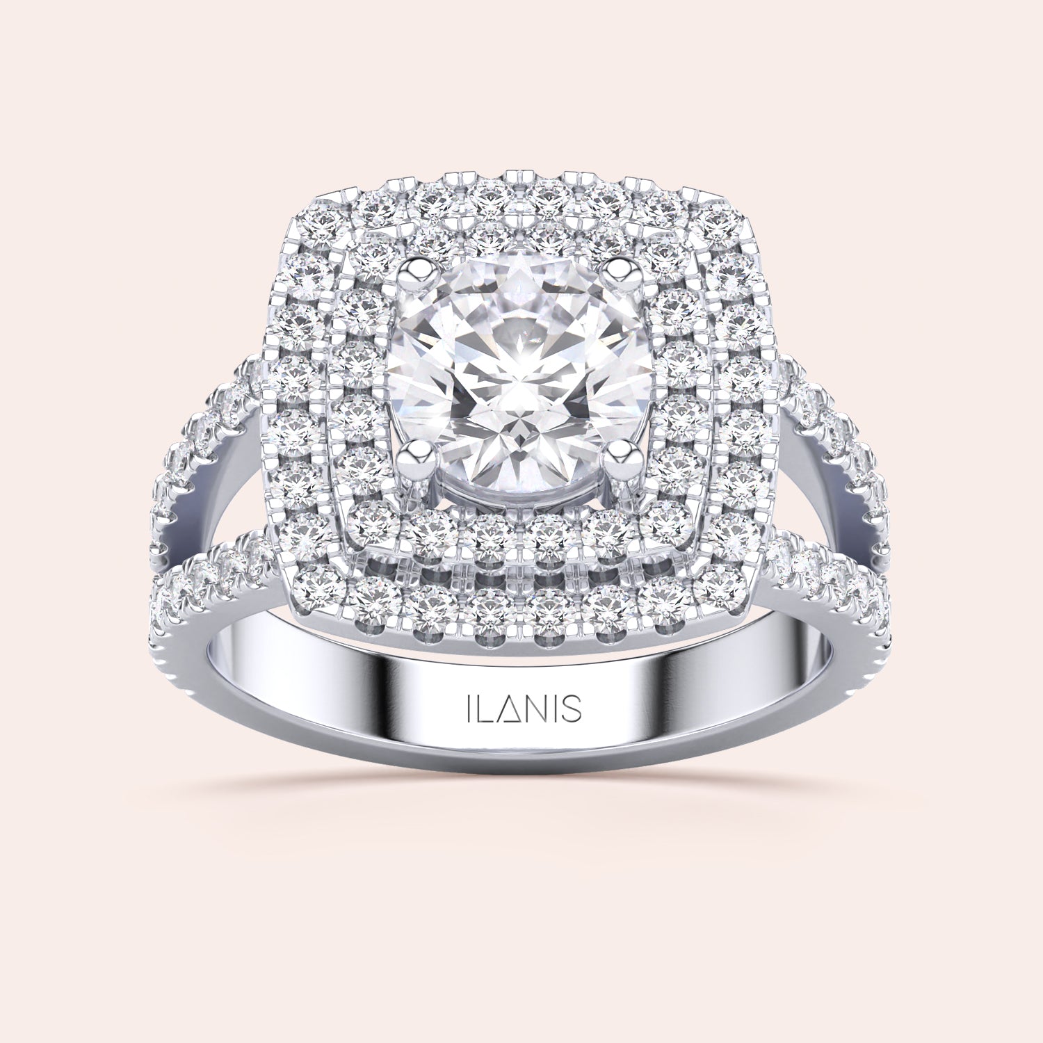 Luxurious 14K diamond engagement ring with a cushion-cut diamond and double halo, featuring a split shank design.|

#14KRecycledWhiteGold
#18KRecycledWhiteGold
#Platinum






