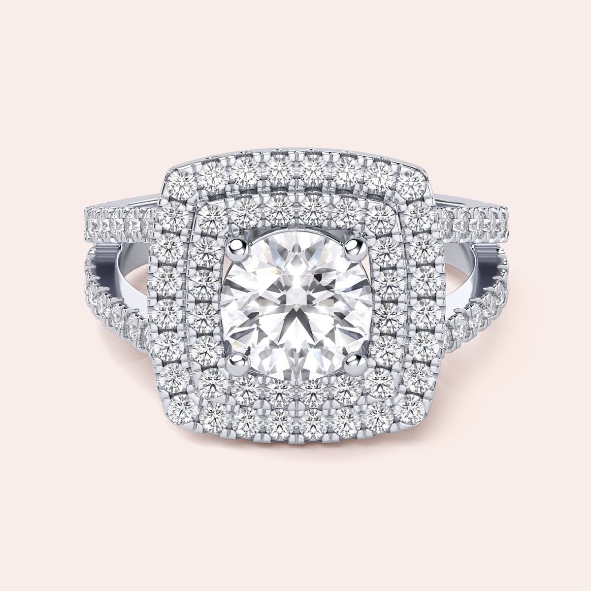 Stunning engagement ring with round diamond center in 14K or 18K gold, featuring a double halo and pave detailing for added elegance.