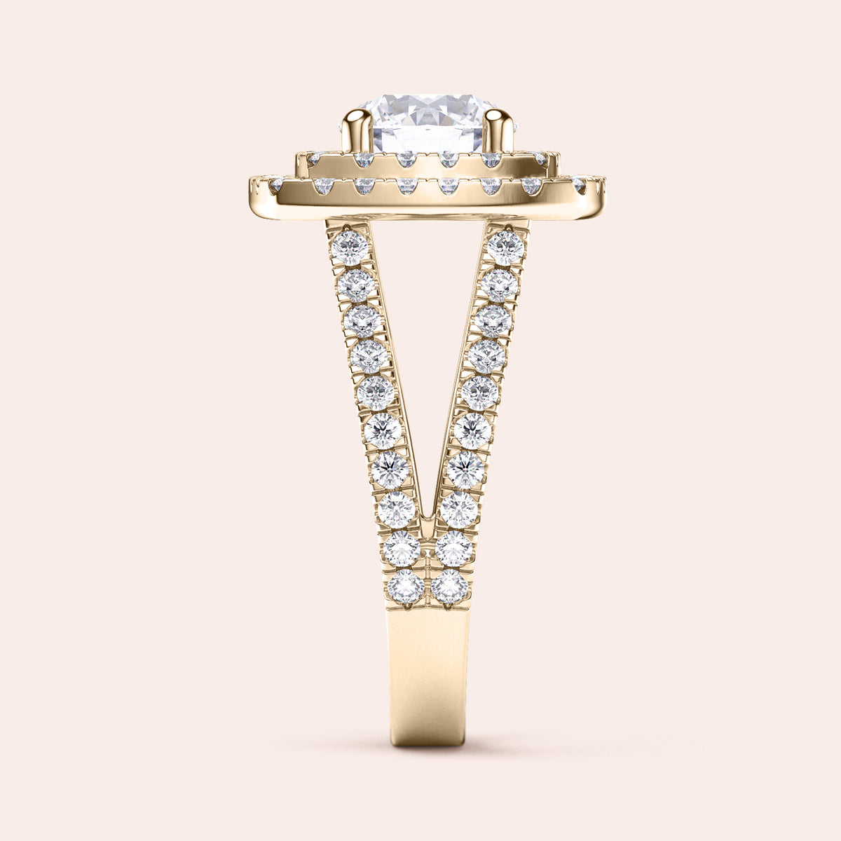 Elegant solitaire pear-shaped diamond engagement ring in pavé band, available in 14K and 18K yellow gold or platinum.