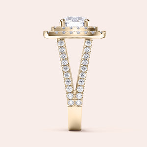 Elegant solitaire pear-shaped diamond engagement ring in pavé band, available in 14K and 18K yellow gold or platinum.