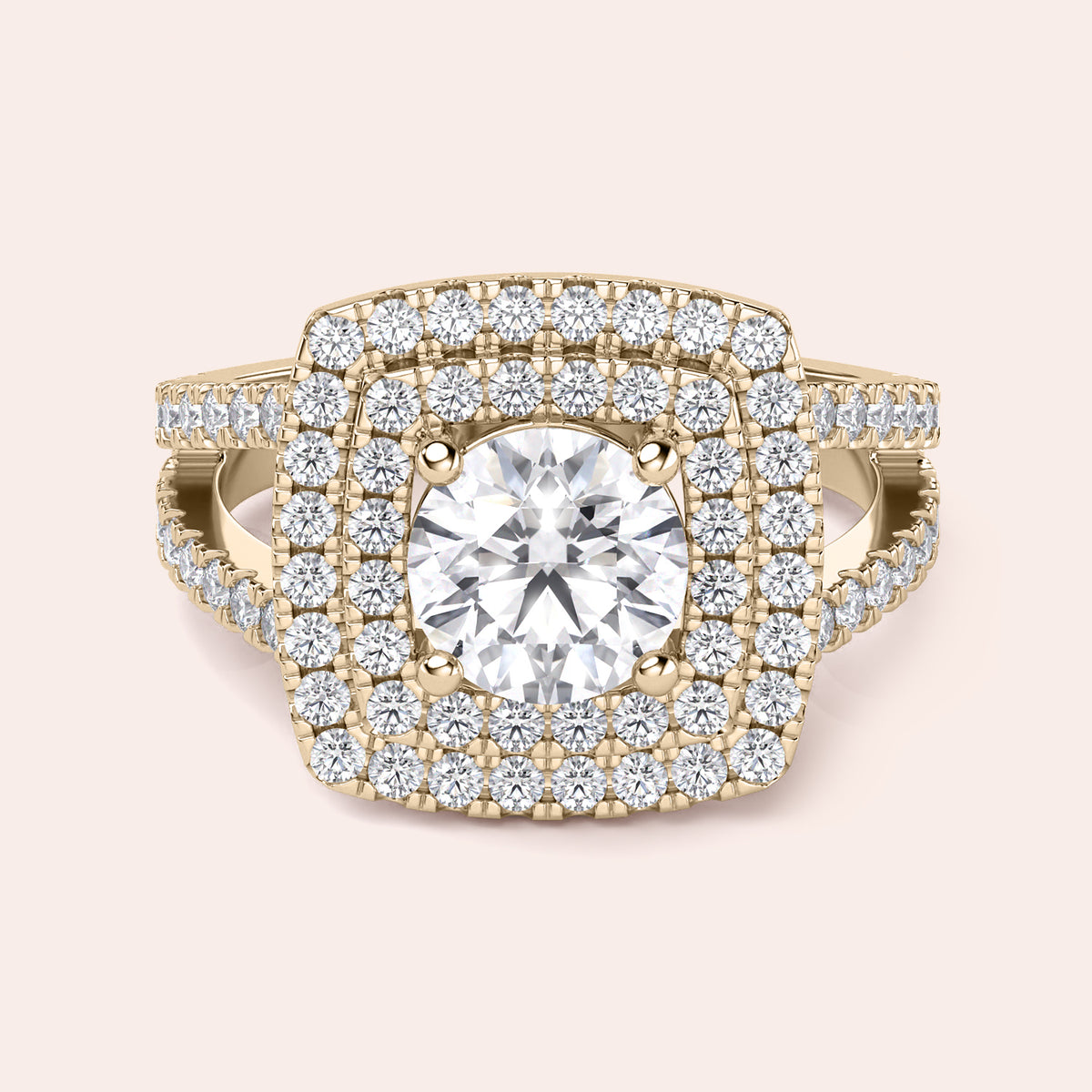 Gold ring with a radiant cushion-cut diamond and double halo, encrusted with diamonds in 14K or 18K gold or platinum.