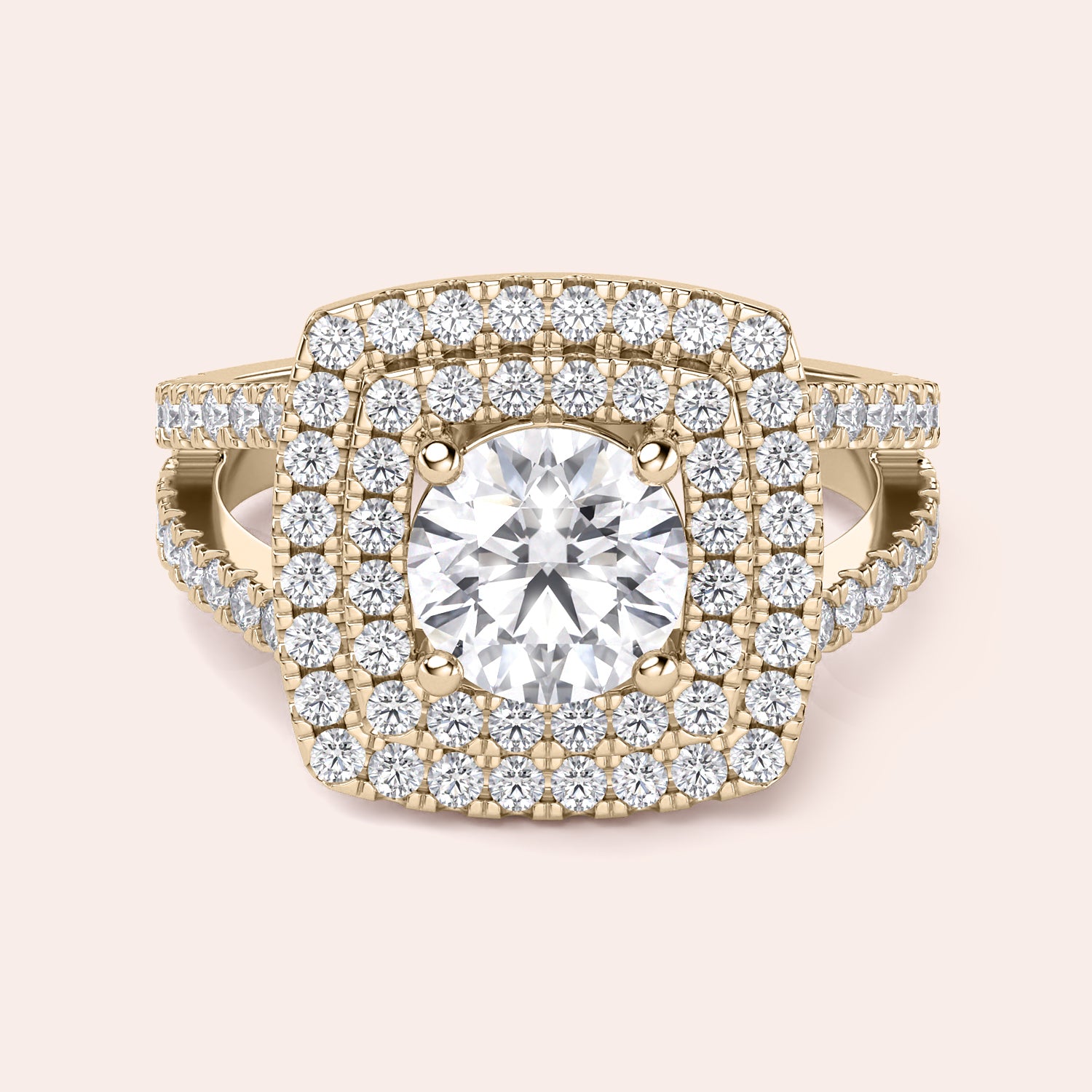 Gold ring with a radiant cushion-cut diamond and double halo, encrusted with diamonds in 14K or 18K gold or platinum.