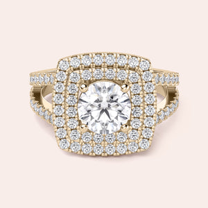 Gold ring with a radiant cushion-cut diamond and double halo, encrusted with diamonds in 14K or 18K gold or platinum.