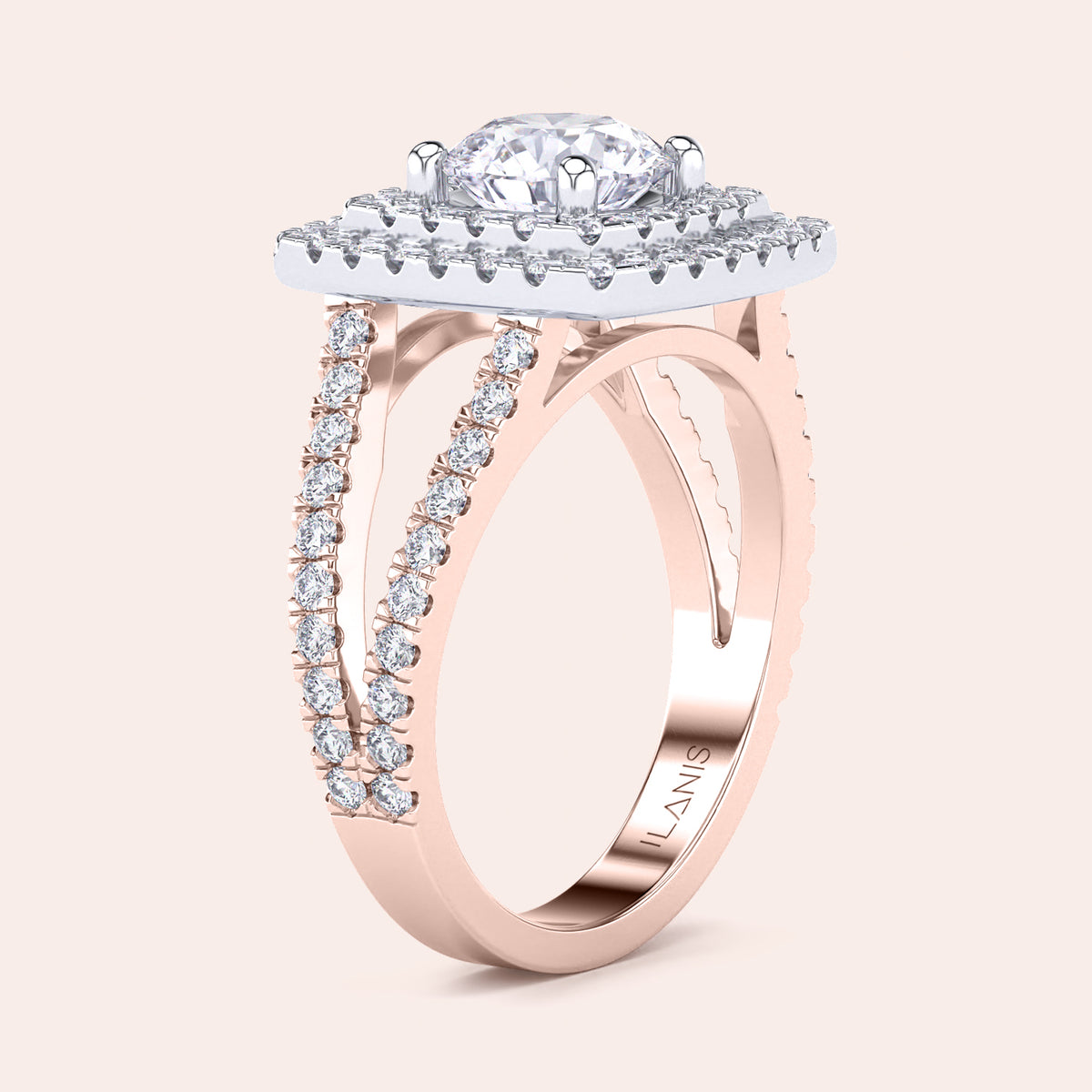 Two-tone 14K/18K white and rose gold diamond ring featuring a round-cut diamond in a double halo design. Perfect for engagements! 