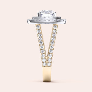 Two-tone 14K round diamond ring in yellow and white gold, featuring a double halo and split shank design, showcased on a model's hand. 