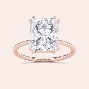 Elegant solitaire ring with a radiant cut diamond in 14K, 18K gold or platinum, showcasing timeless sophistication and style.