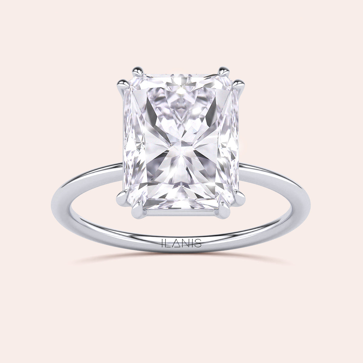 Radiant cut diamond ring in 14K, 18K, or platinum setting, featuring a stunning solitaire design. Not worn on model.