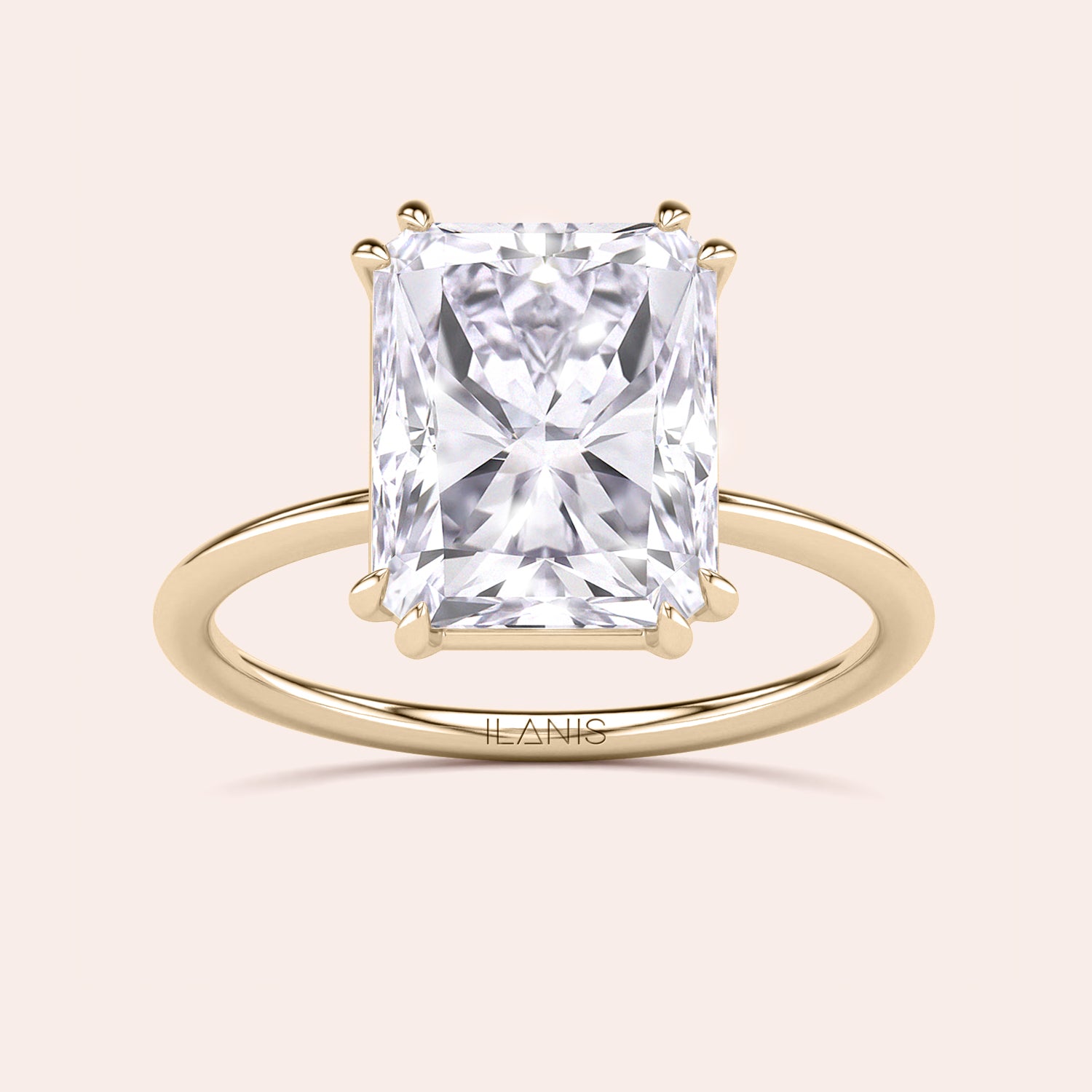 Elegant engagement ring with a radiant-cut diamond in a 14K or 18K yellow gold or platinum band, showcasing brilliance and sophistication.|


#14KRecycledYellowGold 
#18KRecycledYellowGold 