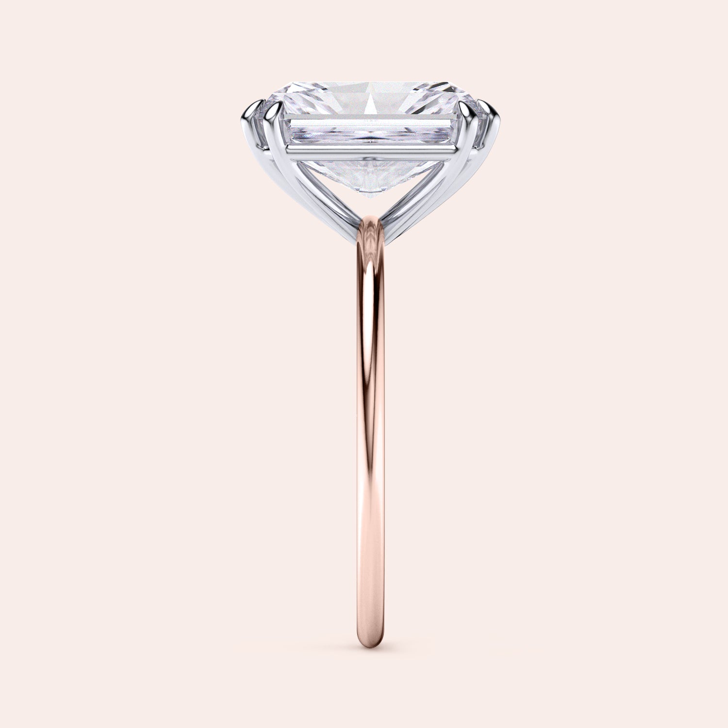 Side view image of Ava Minimalist Solitaire Radiant Cut Diamond Ring featuring a radiant cut diamond set in a two-tone band of either 14K/18K white and yellow gold or white and rose gold, designed for elegance and simplicity, ideal for engagements or special occasions. |
#14KRecycledRose/WhiteGold
#18KRecycledRose/WhiteGold 

