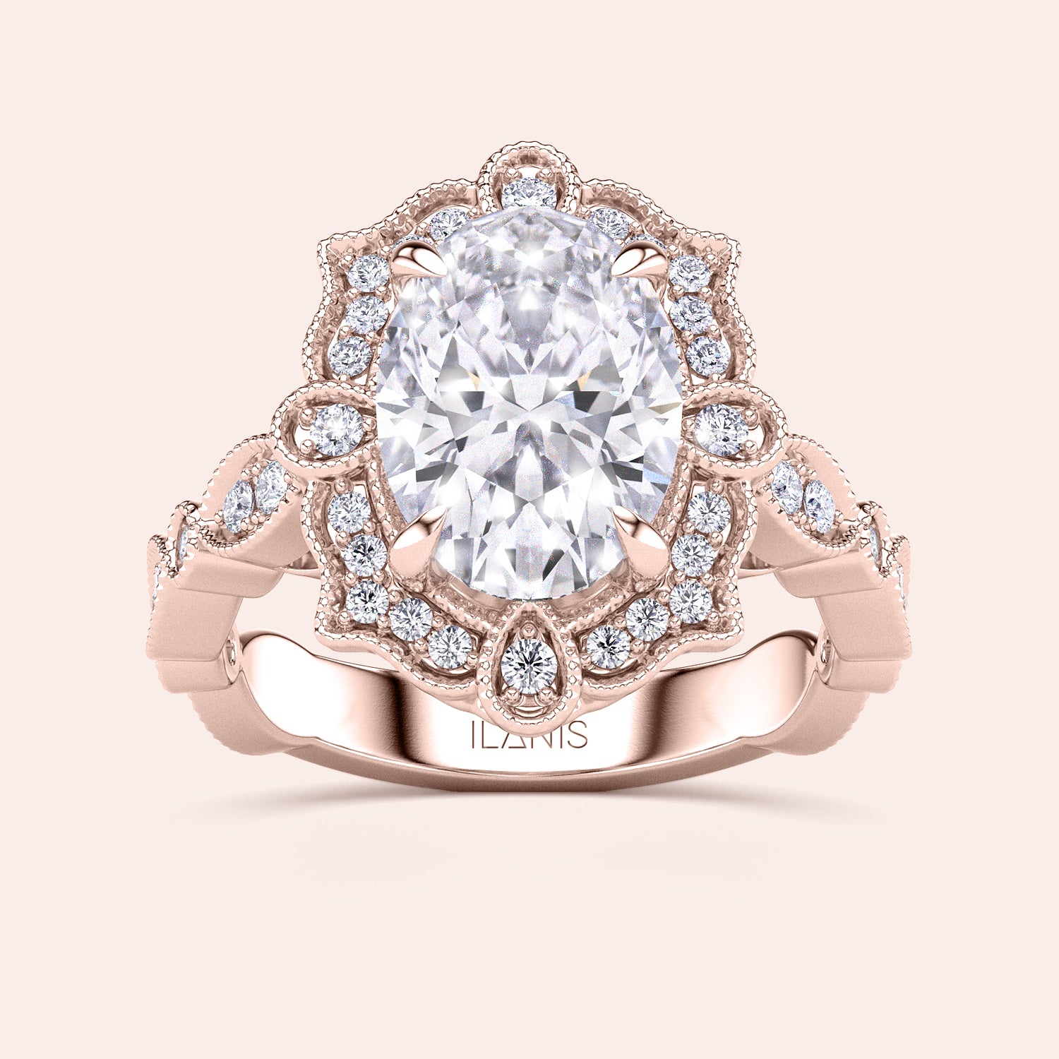 Front close-up of vintage oval halo diamond engagement ring featuring intricate filigree detailing in recycled rose gold | #14KRecycledRoseGold #18KRecycledRoseGold