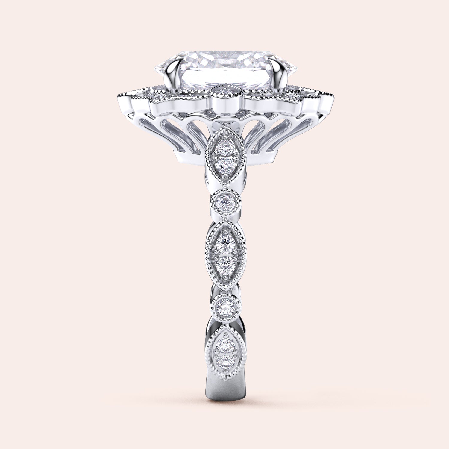 Side view showcasing detailed filigree and diamond accents on vintage oval halo diamond ring in recycled rose gold | #14KRecycledWhiteGold #18KRecycledWhiteGold #Platinum