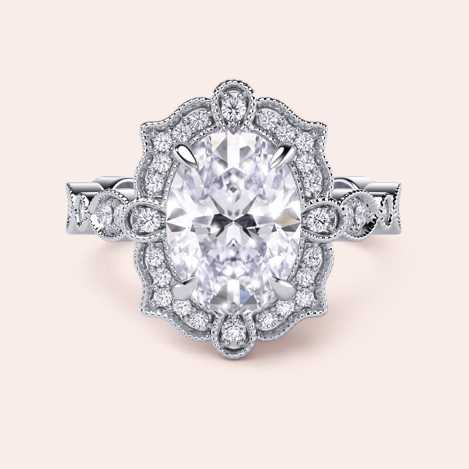 Detailed top view of oval halo vintage-inspired diamond ring set with exquisite filigree in recycled rose gold | #14KRecycledWhiteGold #18KRecycledWhiteGold #Platinum